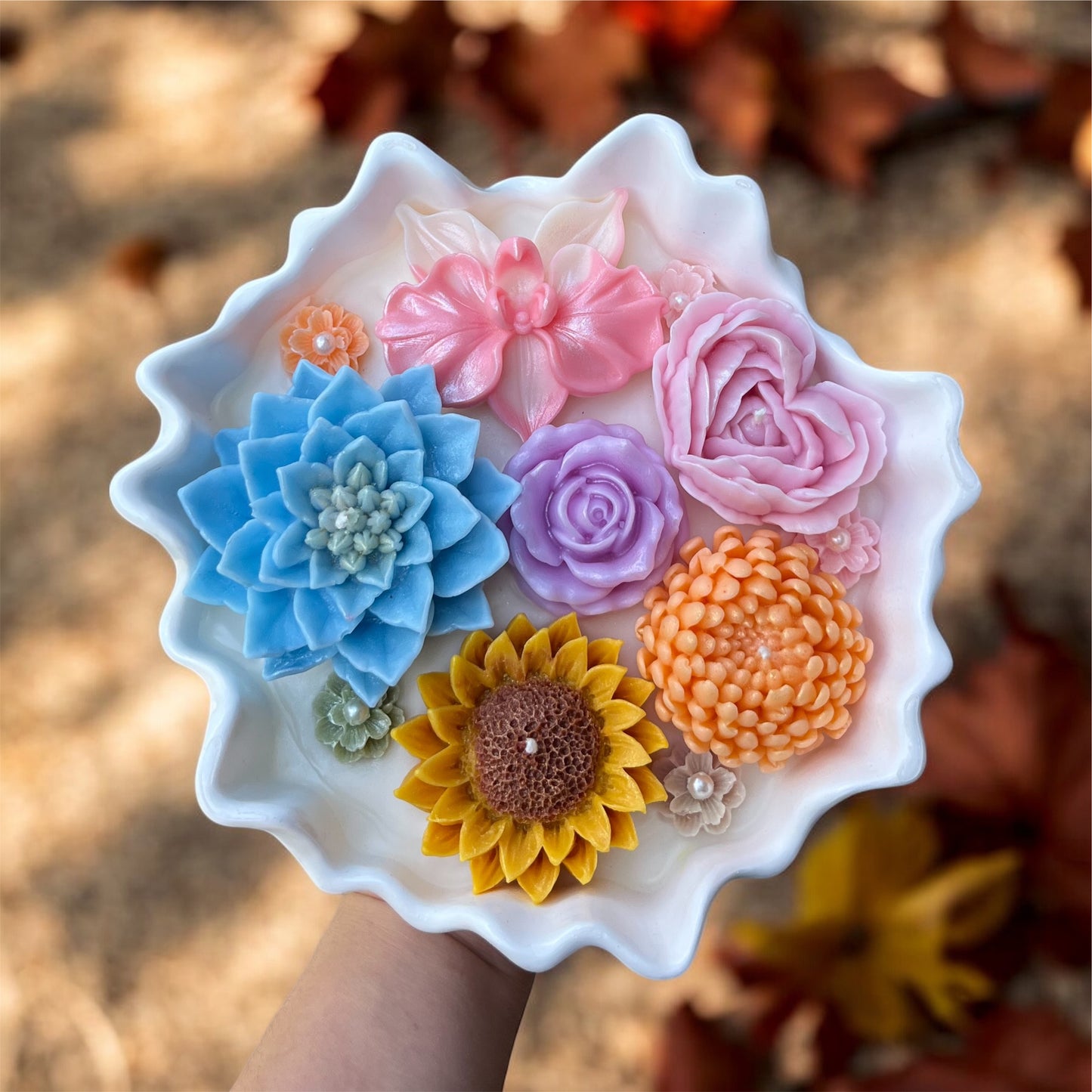 Flower candle in irregular container