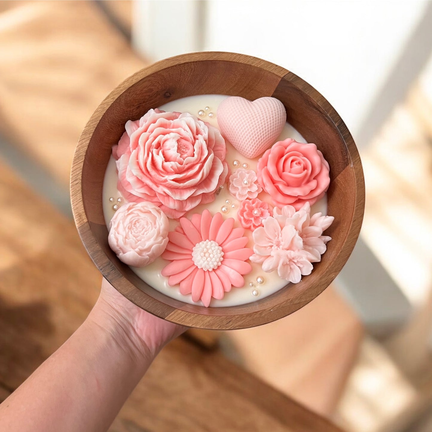 Flowers in a wooden bowl with pearls