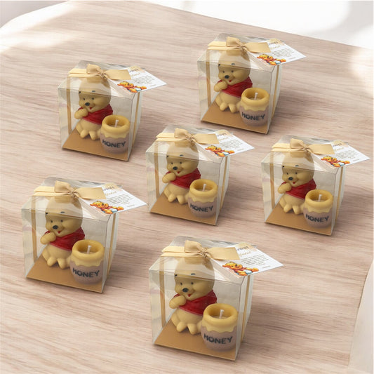 Winnie the Pooh with honey pot in clear box