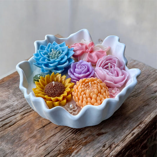 Vela de flores en envase irregular