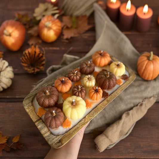 Candle in wooden bowl