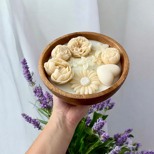 Flowers in a large round wooden bowl