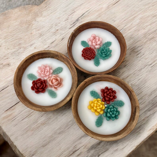 Cactus and succulents in medium wooden bowl